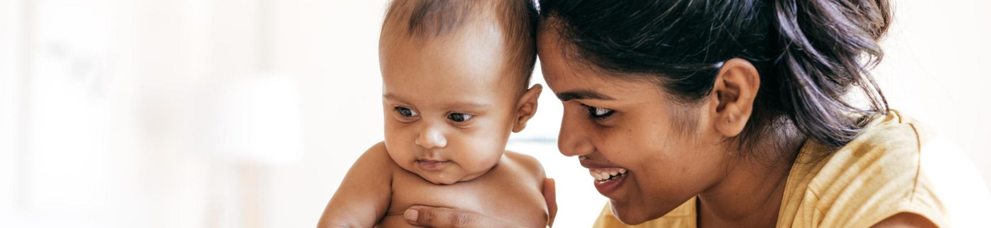 Mother smiling at her baby